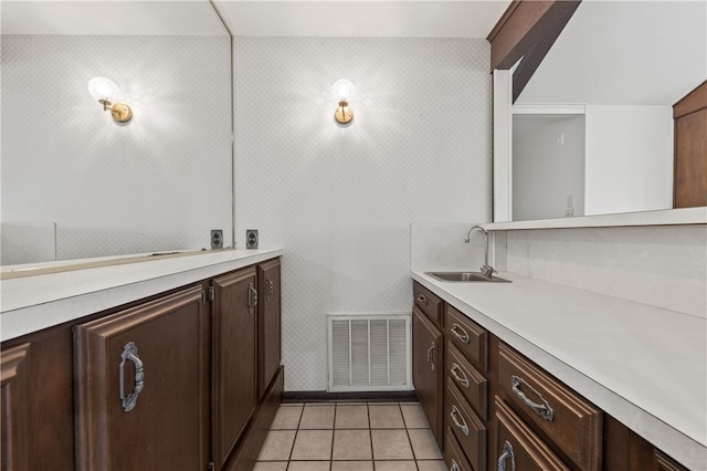 bathroom with vanity and tile patterned floors