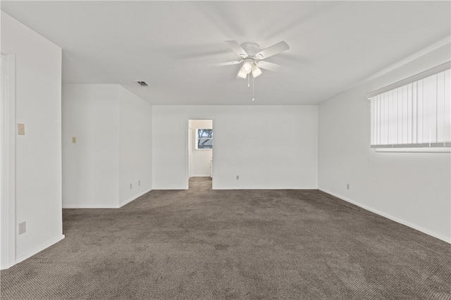 carpeted empty room with ceiling fan