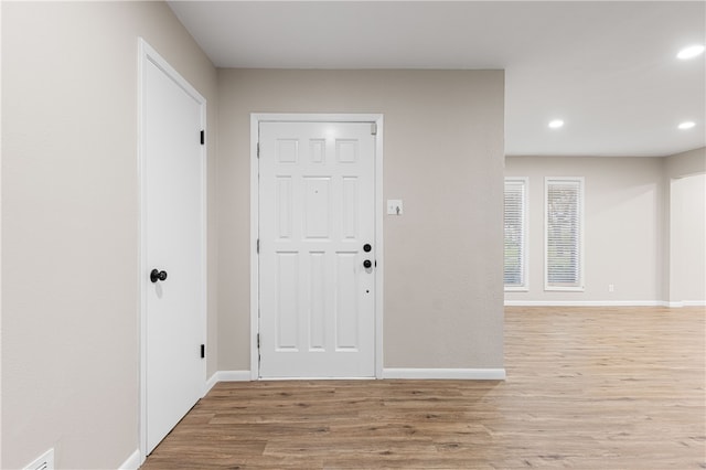 foyer entrance featuring light wood-type flooring