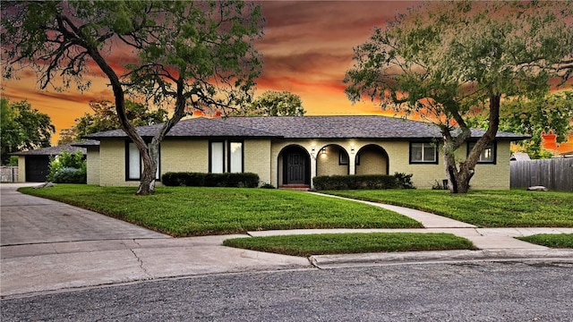 view of front of home featuring a yard