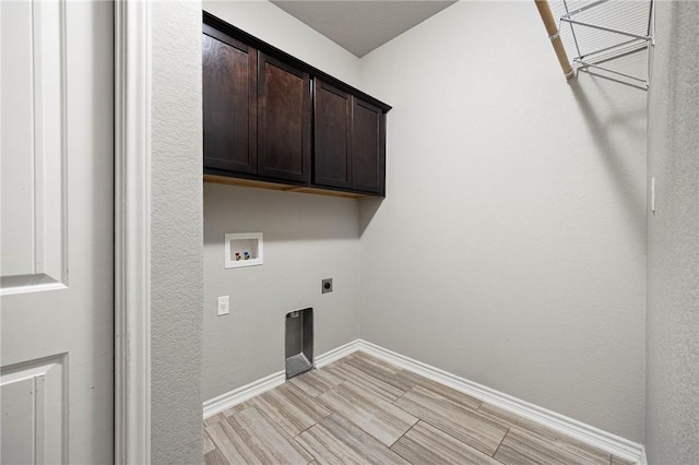 1012 Santa Catalina St, Portland, TX 78374 - laundry room with hookup for an electric dryer, hookup for a washing machine, baseboards, and cabinet space