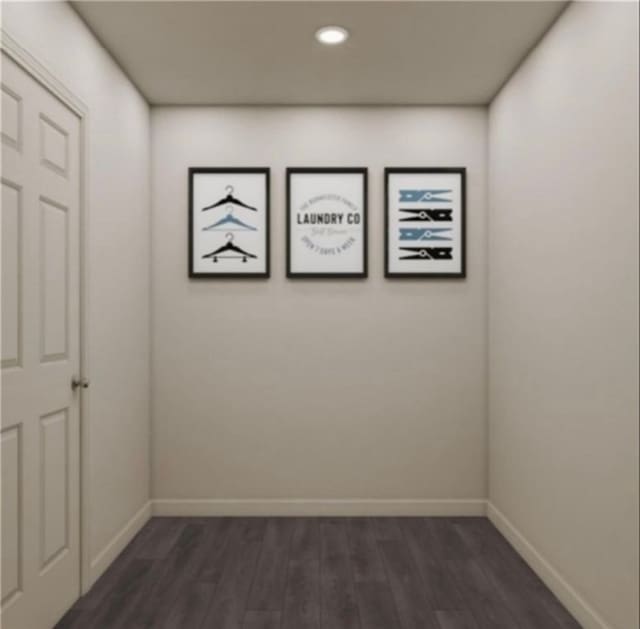 unfurnished room featuring dark hardwood / wood-style flooring