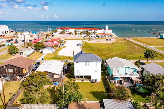 aerial view of residential area with a nearby body of water