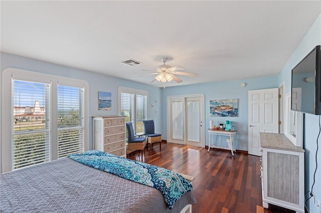 bedroom featuring dark wood-type flooring and ceiling fan