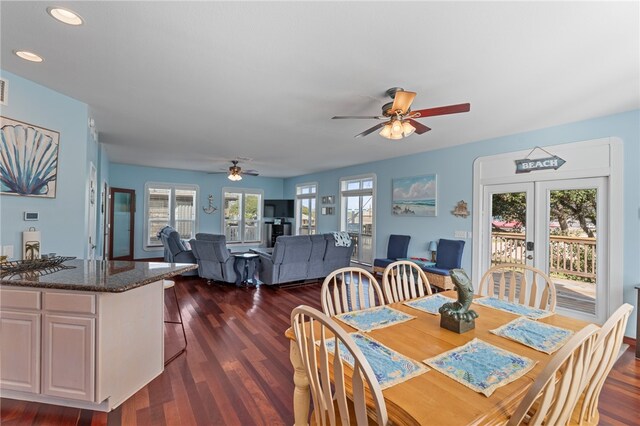 dining area with french doors, dark hardwood / wood-style flooring, and ceiling fan