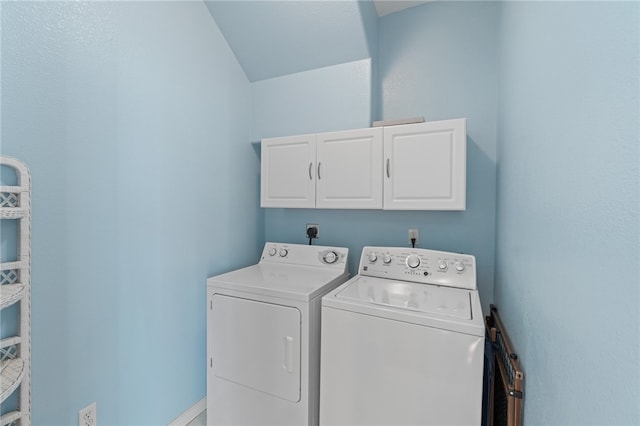 laundry area featuring cabinets and independent washer and dryer