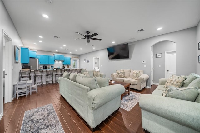 230 Valerie St, Corpus Christi, TX 78418 - living room with arched walkways, a ceiling fan, recessed lighting, dark wood-style floors, and baseboards
