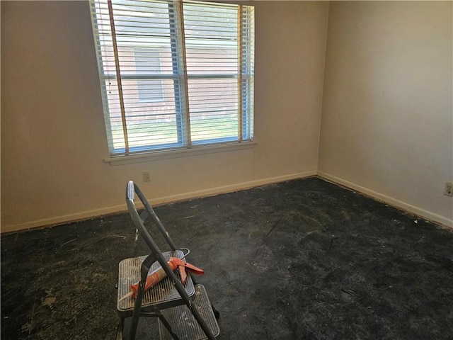 909 Johnson St, Woodsboro, TX 78393 - carpeted empty room featuring baseboards