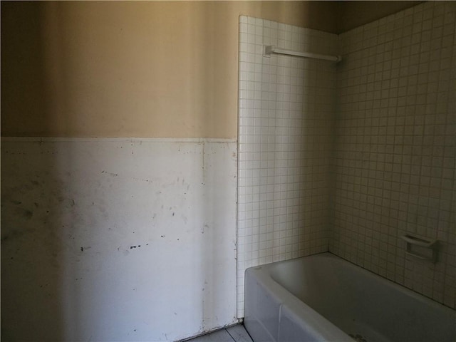 909 Johnson St, Woodsboro, TX 78393 - bathroom featuring a tub to relax in and a shower
