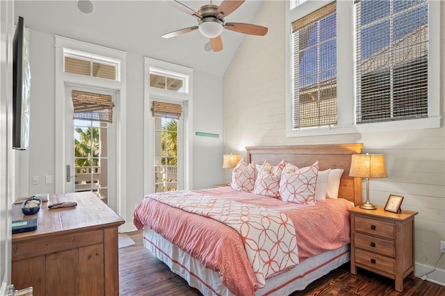 bedroom featuring access to exterior, vaulted ceiling, ceiling fan, and dark wood-type flooring