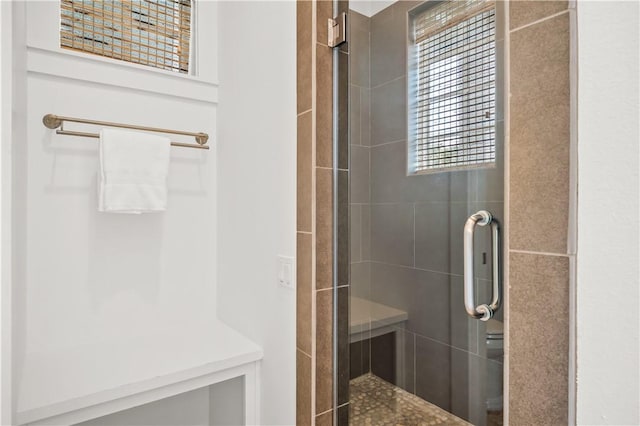104 Still Water Dr, Port Aransas, TX 78373 - bathroom featuring a shower stall and healthy amount of natural light