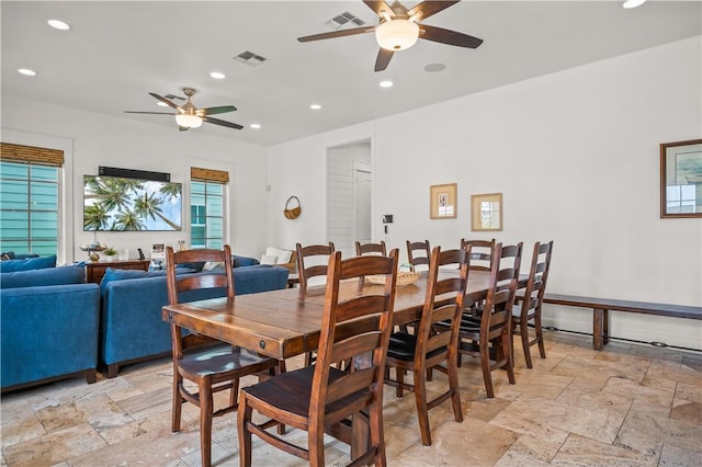 104 Still Water Dr, Port Aransas, TX 78373 - dining room featuring a ceiling fan, recessed lighting, and stone tile flooring