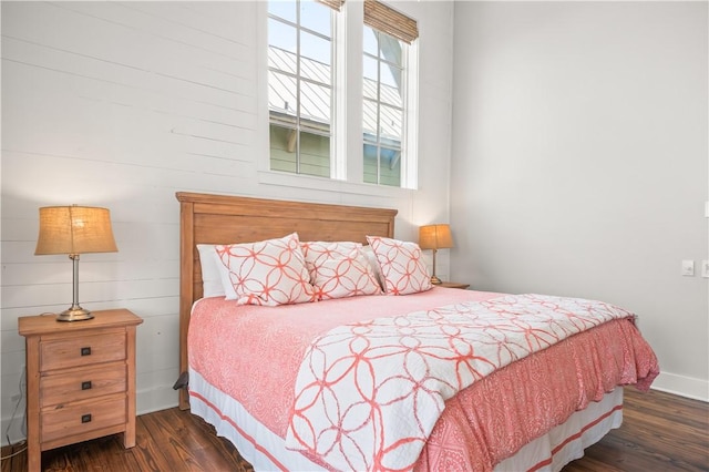104 Still Water Dr, Port Aransas, TX 78373 - bedroom featuring wood finished floors and baseboards
