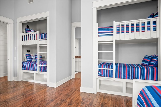 104 Still Water Dr, Port Aransas, TX 78373 - bedroom with wood finished floors and baseboards