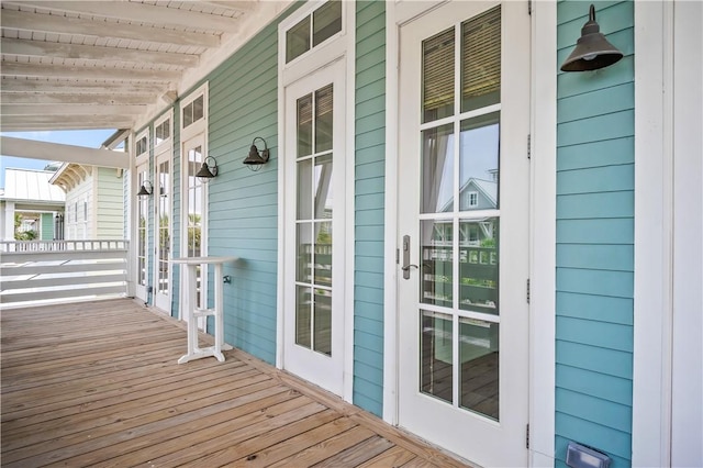 104 Still Water Dr, Port Aransas, TX 78373 - deck featuring covered porch and french doors