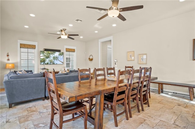 dining area with ceiling fan