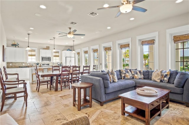 living room with ceiling fan