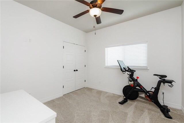 14933 Lake Mead, Robstown, TX 78380 - workout room with light colored carpet, a ceiling fan, and baseboards