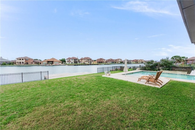 14933 Lake Mead, Robstown, TX 78380 - view of yard featuring a residential view, a water view, and a patio area