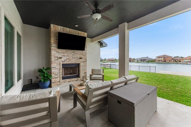 14933 Lake Mead, Robstown, TX 78380 - view of patio with an outdoor living space with a fireplace, a ceiling fan, and a residential view