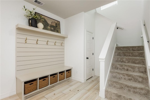 14933 Lake Mead, Robstown, TX 78380 - mudroom featuring wood finished floors and baseboards