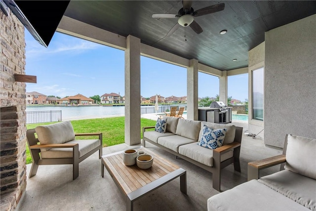 14933 Lake Mead, Robstown, TX 78380 - sunroom / solarium with a water view, outdoor lounge area, ceiling fan, and a residential view