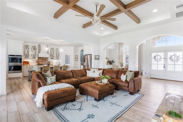14933 Lake Mead, Robstown, TX 78380 - living area featuring arched walkways, coffered ceiling, recessed lighting, a ceiling fan, and beam ceiling