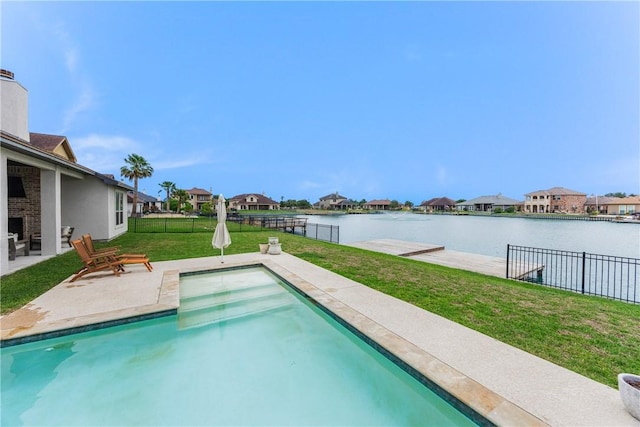 14933 Lake Mead, Robstown, TX 78380 - outdoor pool featuring a water view, a residential view, and a patio