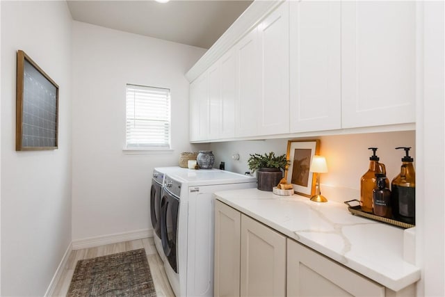 14933 Lake Mead, Robstown, TX 78380 - laundry room featuring cabinet space, washing machine and clothes dryer, and baseboards