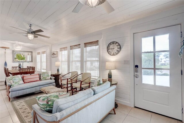 4034 Laguna Shores Rd, Corpus Christi, TX 78418 - living room featuring light tile patterned floors, wooden ceiling, and a ceiling fan