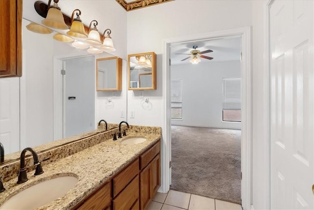 bathroom with tile patterned floors and vanity