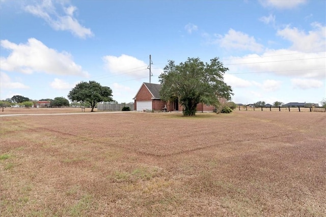 view of yard featuring a garage