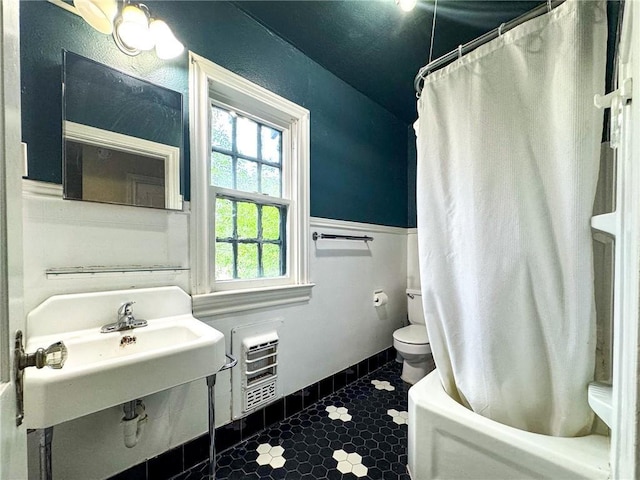 bathroom with toilet and sink