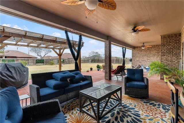 view of patio / terrace with a pergola, grilling area, and outdoor lounge area