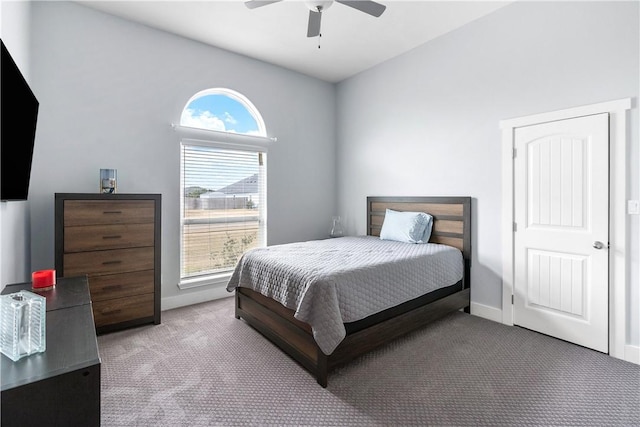 bedroom with light carpet and ceiling fan