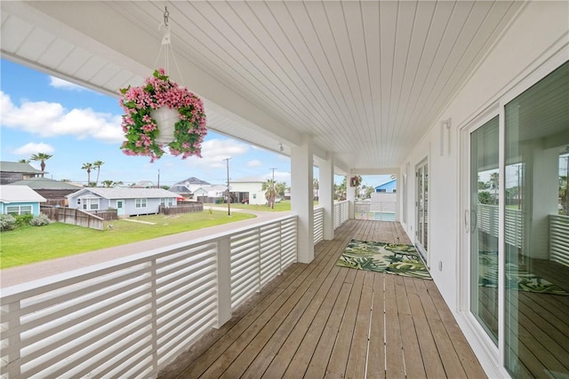 416 E Ave C Ave, Port Aransas, TX 78373 - porch featuring a residential view and a lawn