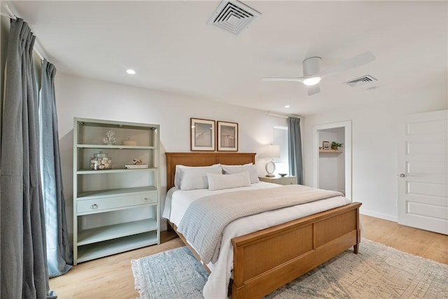 416 E Ave C Ave, Port Aransas, TX 78373 - bedroom featuring light wood-style floors, a ceiling fan, and recessed lighting