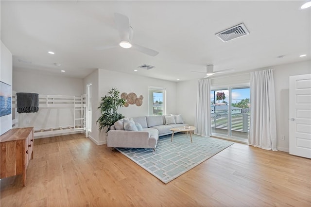 416 E Ave C Ave, Port Aransas, TX 78373 - living area with ceiling fan, light wood-style floors, recessed lighting, and baseboards