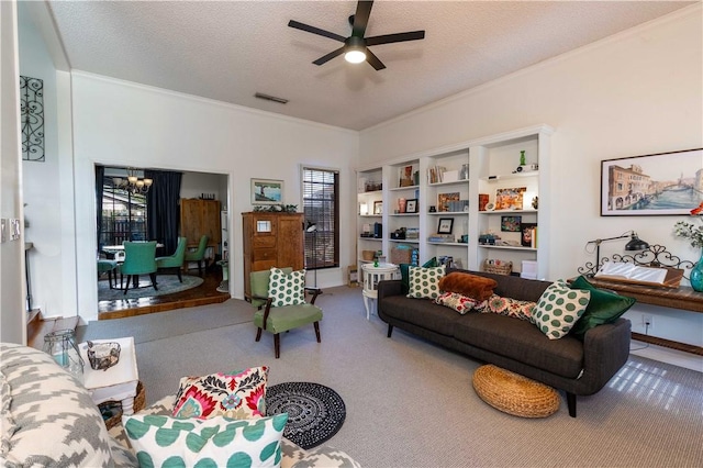 carpeted living room with crown molding, ceiling fan with notable chandelier, and a textured ceiling