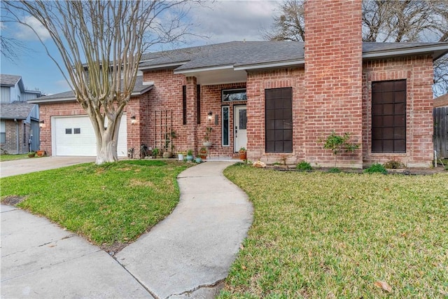 ranch-style house featuring a garage and a front lawn