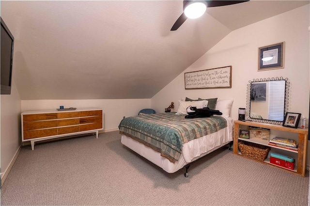 carpeted bedroom with ceiling fan and lofted ceiling