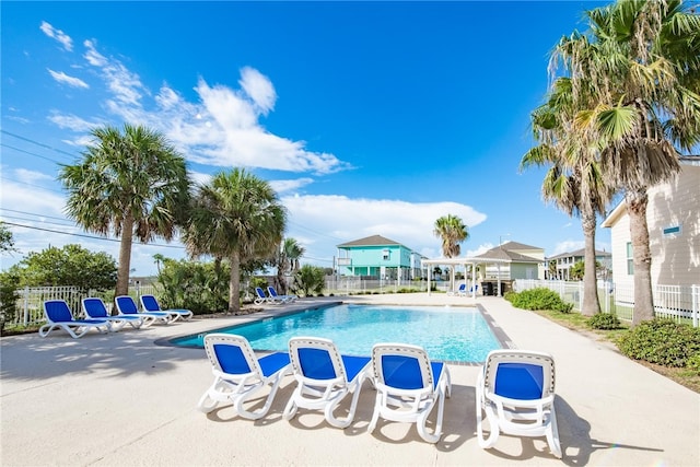 view of swimming pool featuring a patio area