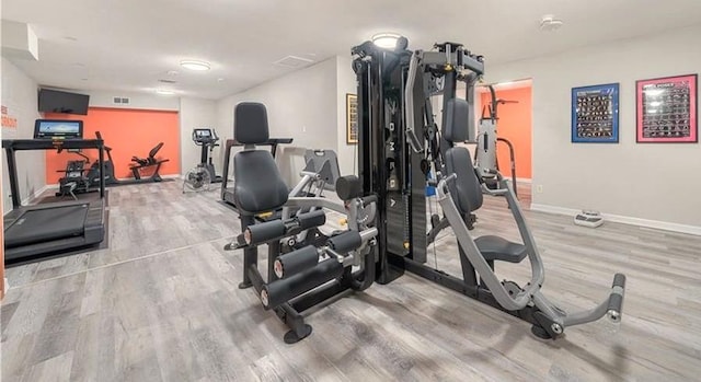1400 Ocean Dr Unit 503-C, Corpus Christi, TX 78404 - exercise room with wood finished floors and baseboards