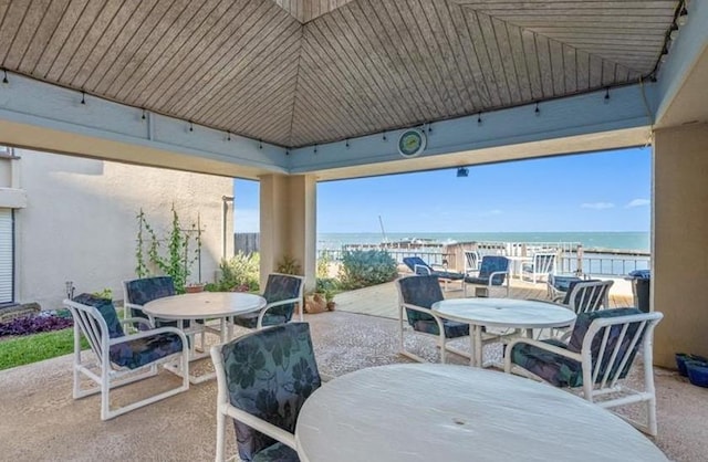 1400 Ocean Dr Unit 503-C, Corpus Christi, TX 78404 - view of patio / terrace featuring outdoor dining area and a water view