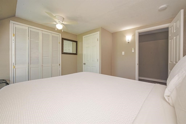 bedroom featuring ceiling fan and vaulted ceiling