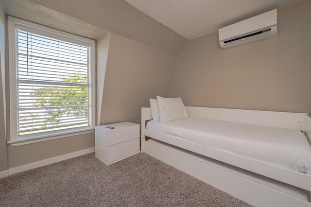 carpeted bedroom featuring vaulted ceiling, a wall unit AC, and multiple windows