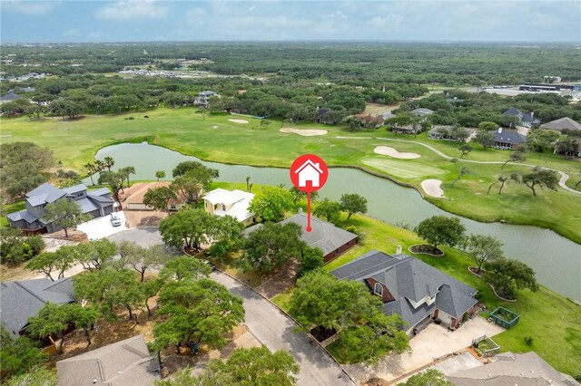 bird's eye view featuring a water view, golf course view, and a residential view
