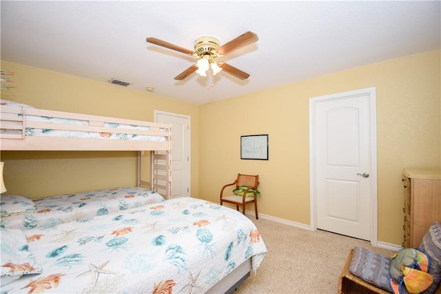 bedroom with light carpet, baseboards, visible vents, and ceiling fan