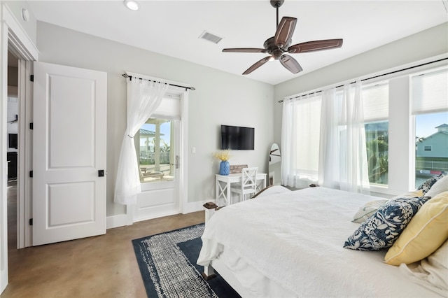 bedroom featuring concrete flooring and ceiling fan