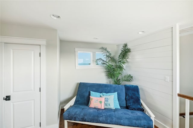 living area with dark hardwood / wood-style floors